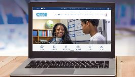  computer with cms webpage displayed